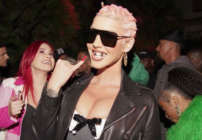 Incomparable Clownery: Disappointing Dorito Endorser Amber Rose Adorns Herself In Donald Trump-Themed Jewelry​