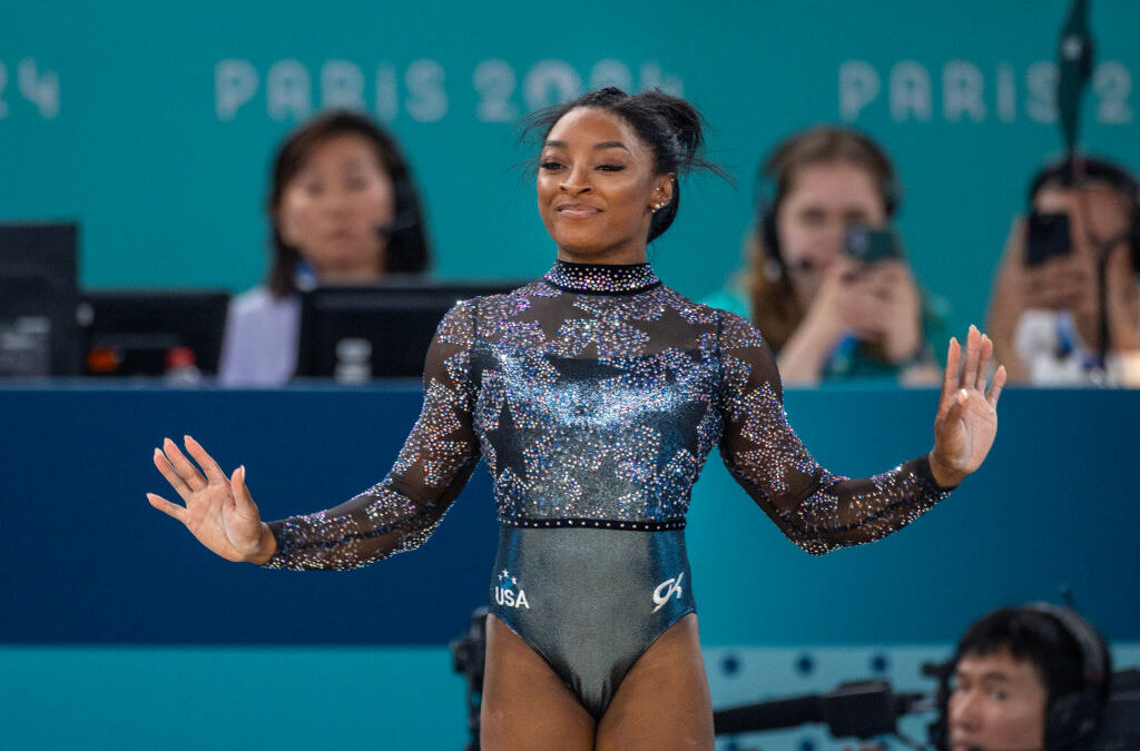 Simone Biles Suffers Minor Injury, Pushes Through To Lead U.S. In Olympic Qualifying​