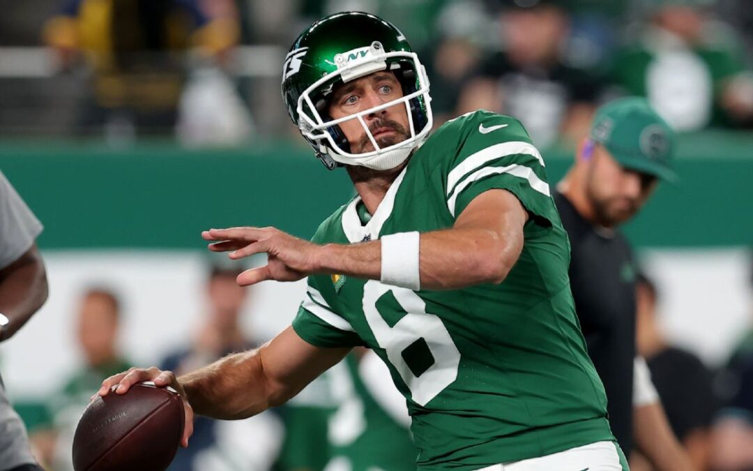 Rodgers dazzles in Jets home-opening win over Patriots​