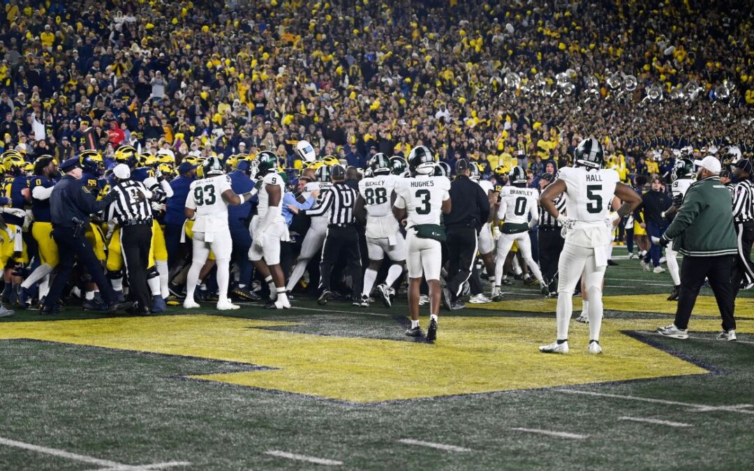 Punches thrown as Michigan beats Michigan St.​