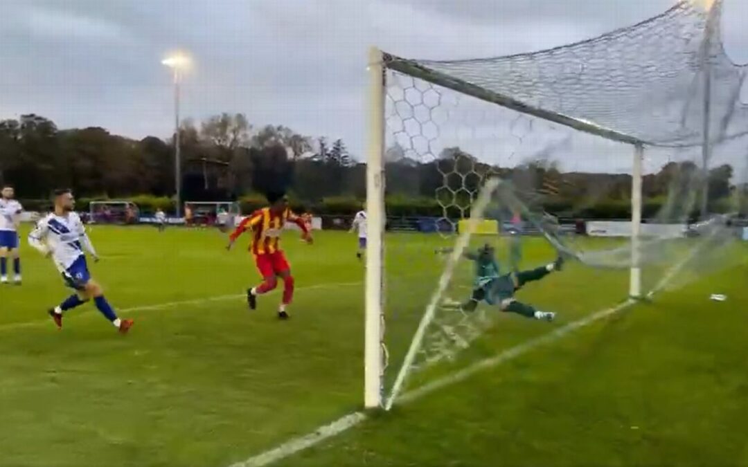 Goalkeeper stops certain goal while tangled in net​​